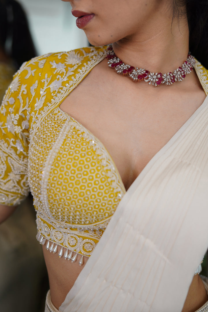 Yellow Hand Embroidered Blouse with White Drape Satin Saree and Belt