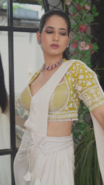 Load and play video in Gallery viewer, Yellow Hand Embroidered Blouse with White Drape Satin Saree and Belt
